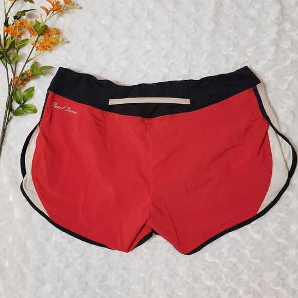Pearl Izumi medium red black and white running shorts with zippered pocket - Picture 3 of 5